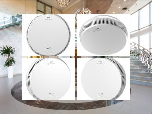 A set of four indoor air pollution monitors with sleek designs, ideal for monitoring air quality in modern spaces.